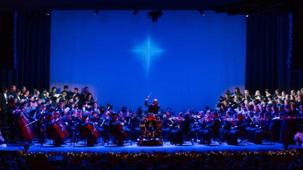 Wide angle shot of musicians at Christmas by Candlelight